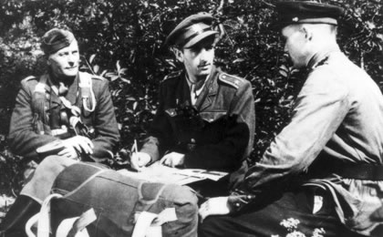 Poland - Dukla Pass; Staff of 2nd Czechoslovak Paradesant Brigade in Zarzin village, September 1944; Staff Captain Karel Hlasny and commander of the 2nd Paradesant Batallion  Major Frantisek Voves (left) with a Russian  officer (right), before the „ Besko Battle“